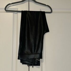 Express embossed zippered leggings. Size M. NWT.